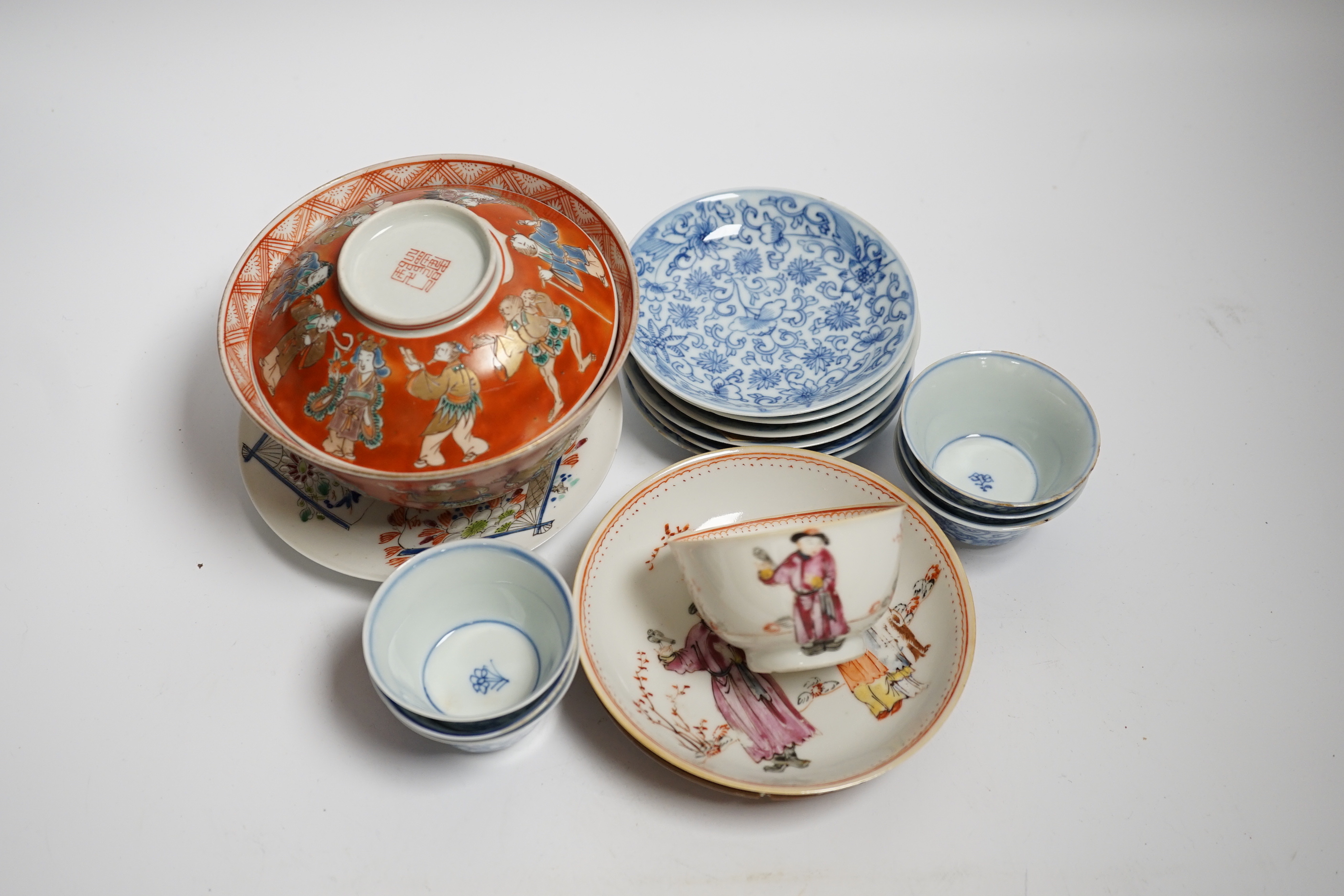 A set of six Chinese blue and white tea bowls and saucers, Kangxi period, a Chinese famille rose tea bowl and saucer, a Batavia ware saucer, both 18th century and Japanese ceramics